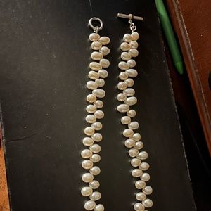 Two pieces. Fresh Water Pearls and Sterling Silver necklace and bracelet match.